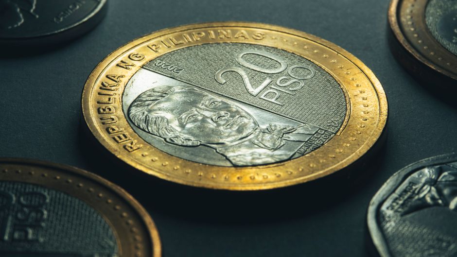 Close-up of Mexican Peso banknotes and coins