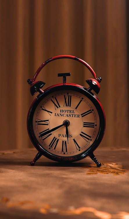 Free Close Up Photo of a Red Analog Clock Stock Photo