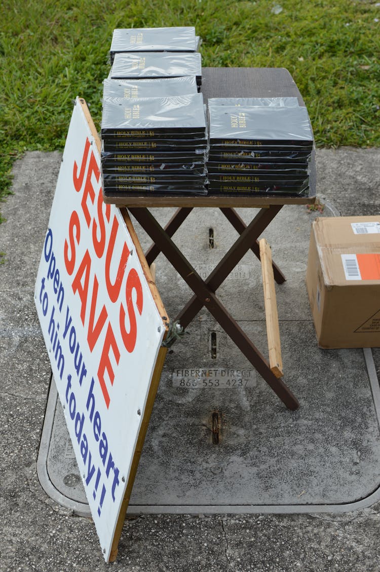 Bible And Poster On A Table