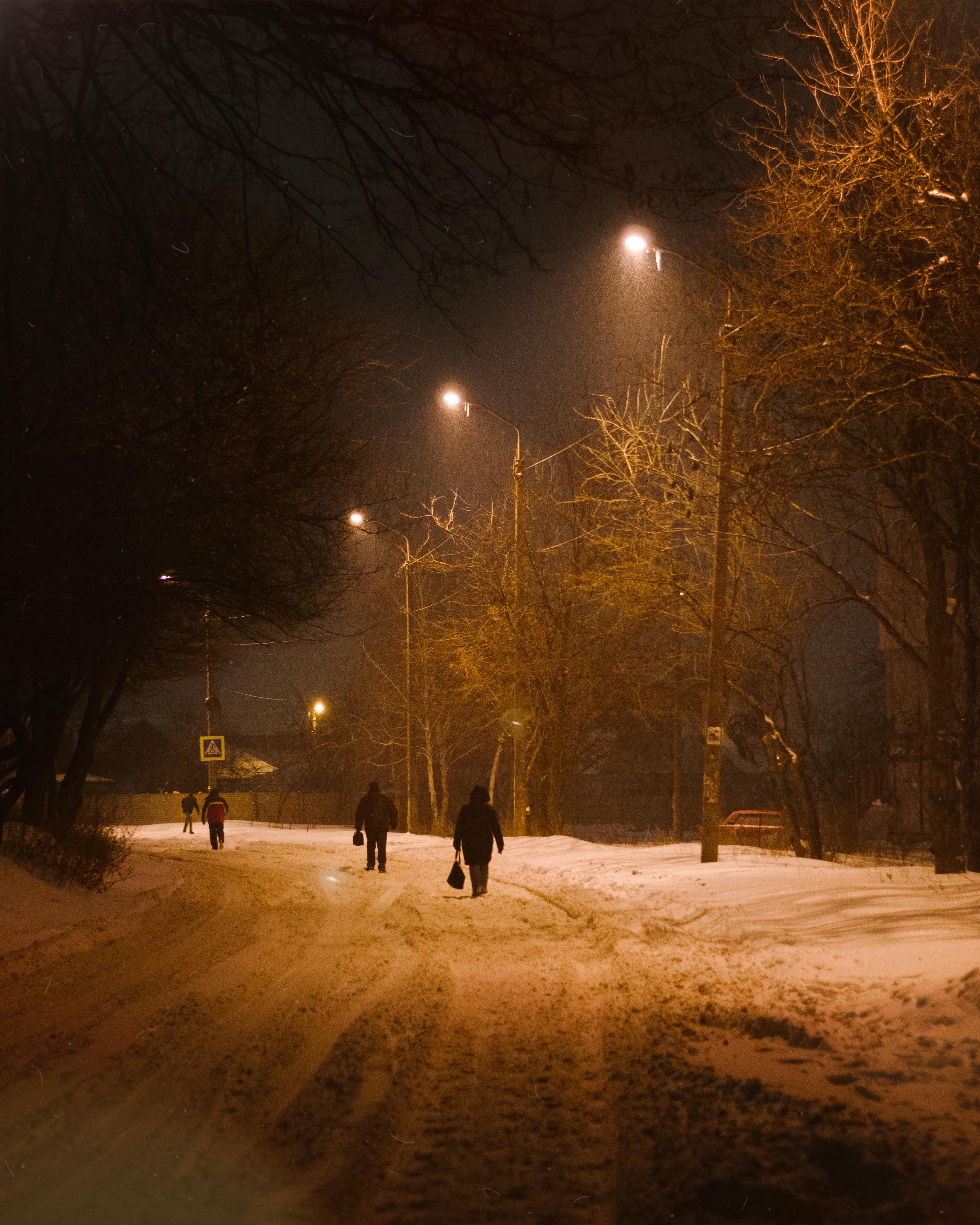 People Walking on a Tunnel with Pink Illuminated Lights · Free Stock Photo