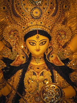 Intricate and colorful idol of Goddess Durga celebrated during the Durga Puja festival in Kolkata, India.