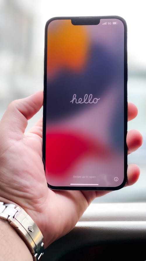 Close Up Shot of a Person Holding a Cellphone