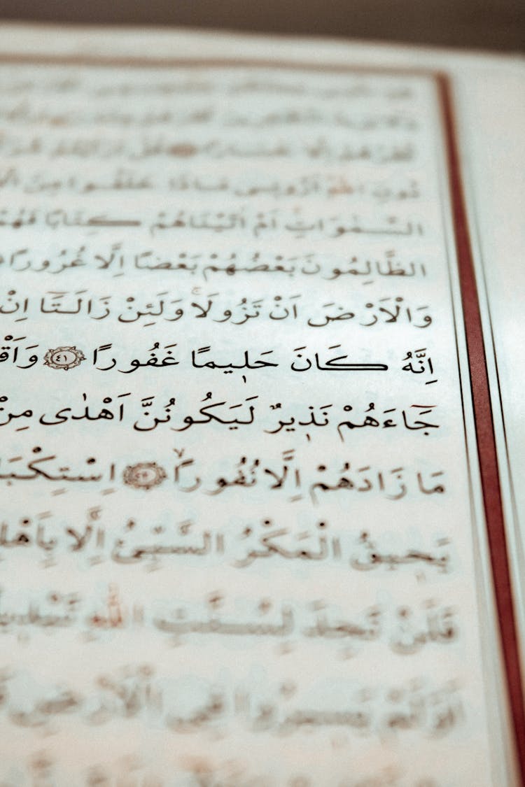 Close-Up Shot Of Arabic Text On A Paper