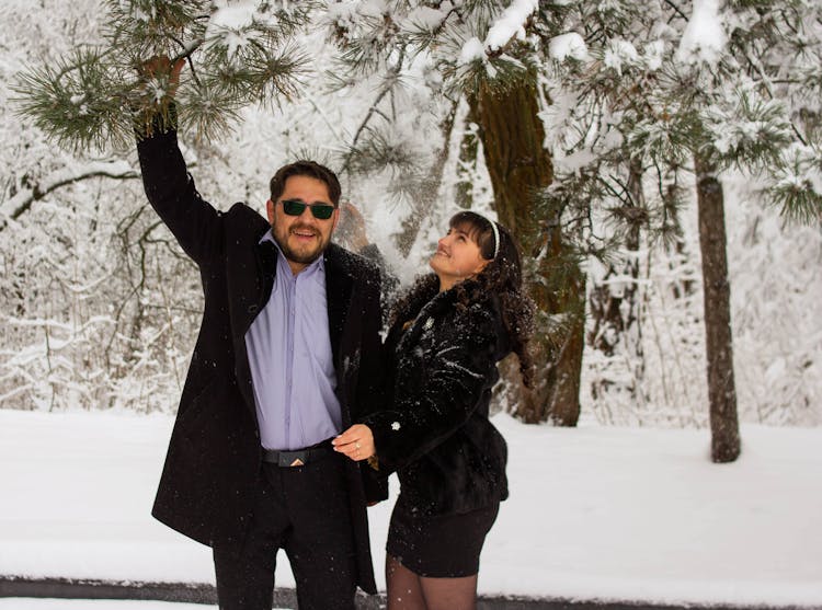 Couple Posing In Snow