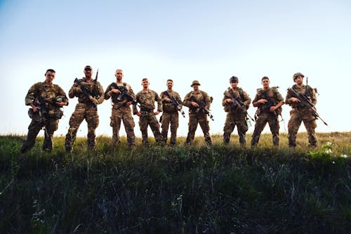 Soldiers Standing on a Field