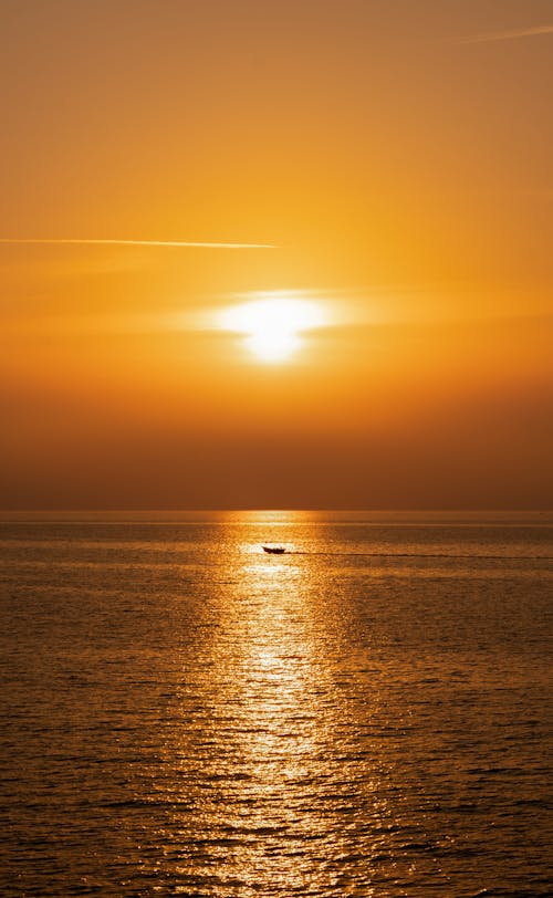 Gratis lagerfoto af dramatisk, gylden time, hav