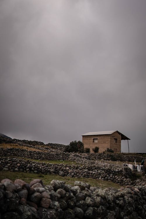 A Wooden House on a Rocky Hill