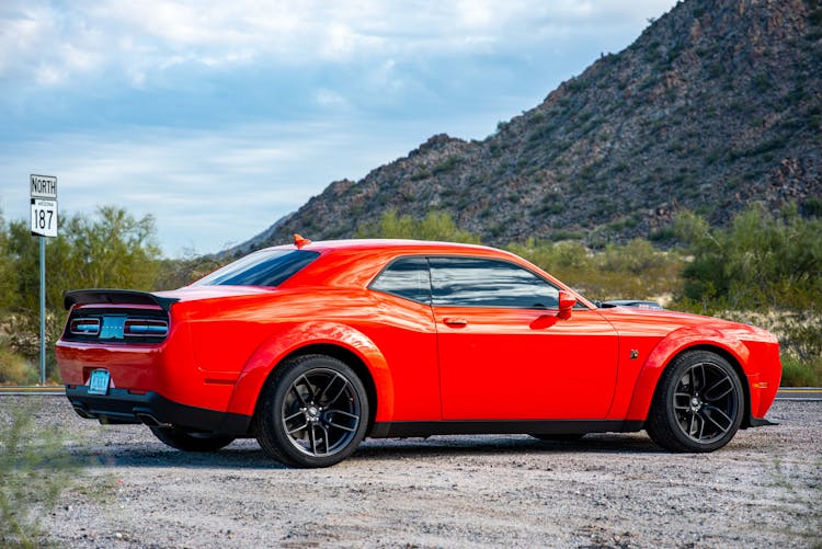 Side View Of A Red Dodge Challenger