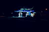 Helicopter On Top of a Gasoline Station