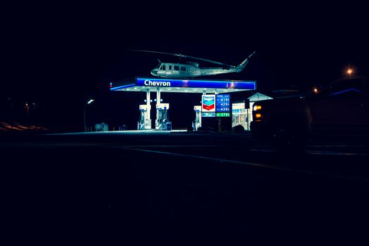 Helicopter On Top of a Gasoline Station