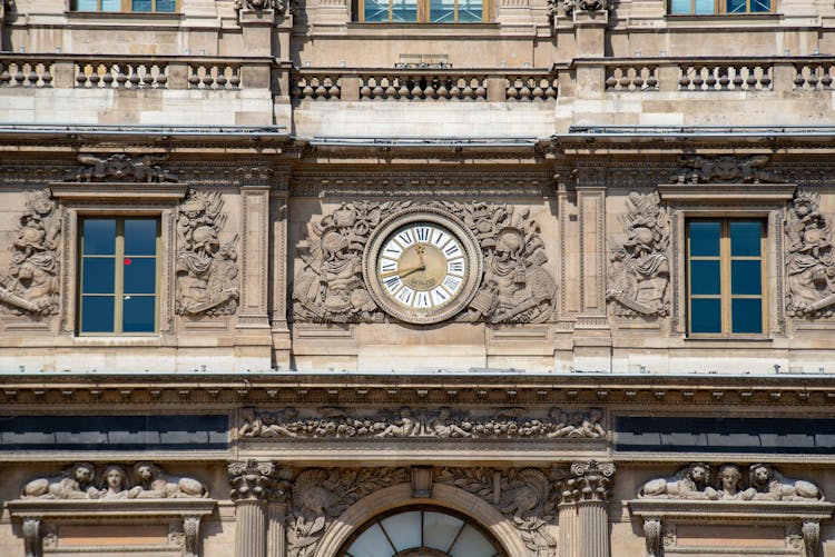 Clock On Medieval Building Wall