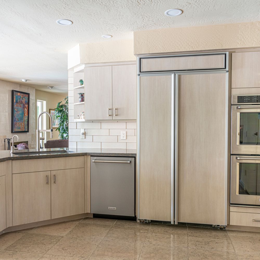Kitchen Spraying in Sutton — quality trade paint going on in two coats