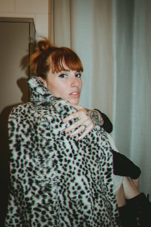 Stylish Woman in Leopard Print Coat
