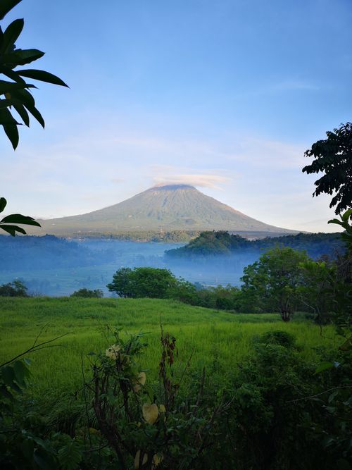 Free Explore the lush greenery and captivating view of Mount Agung amidst Bali's serene landscape. Stock Photo