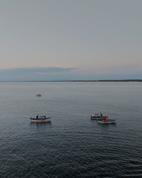 Aerial Footage of Boats on Body of Water 