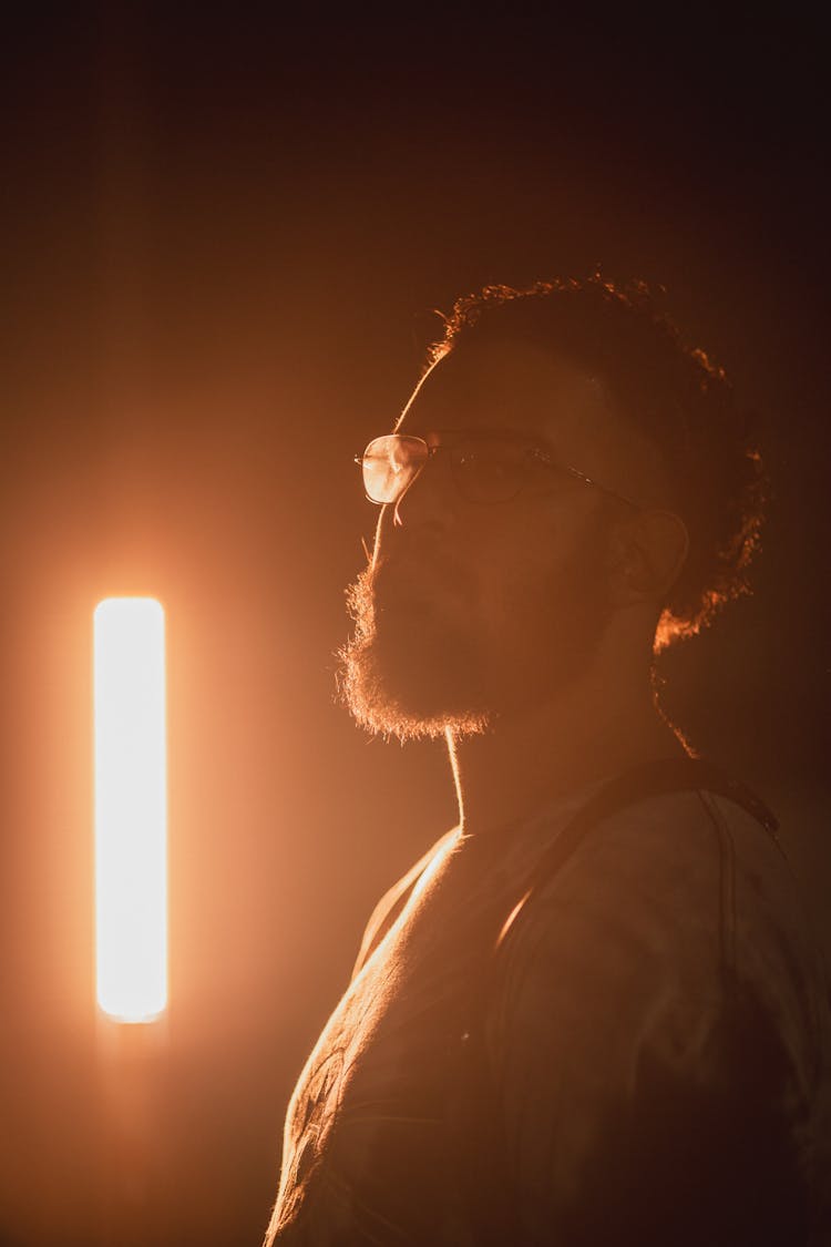 Man With Eyeglasses Near Light 