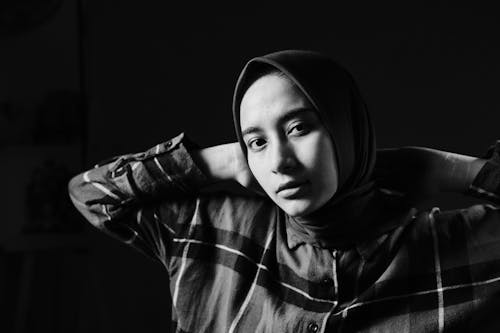 Grayscale Photo of a Woman in Hijab Posing