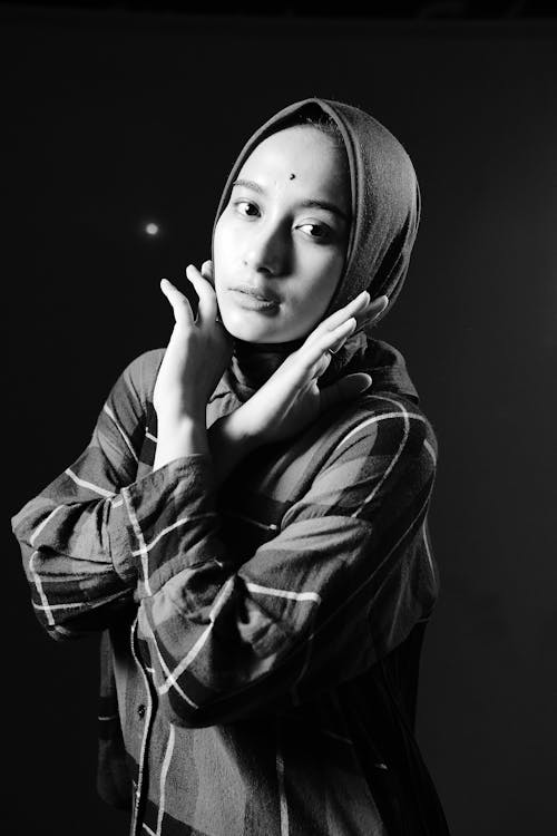 Woman in Plaid Top Wearing Hijab