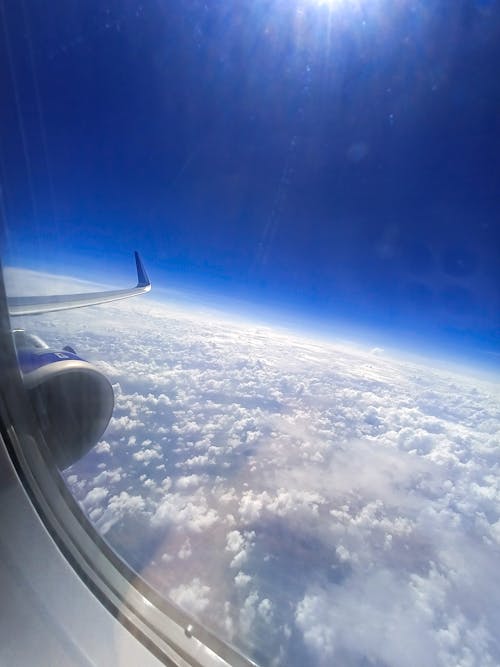 Free stock photo of aerial shot, airplane, airplane window