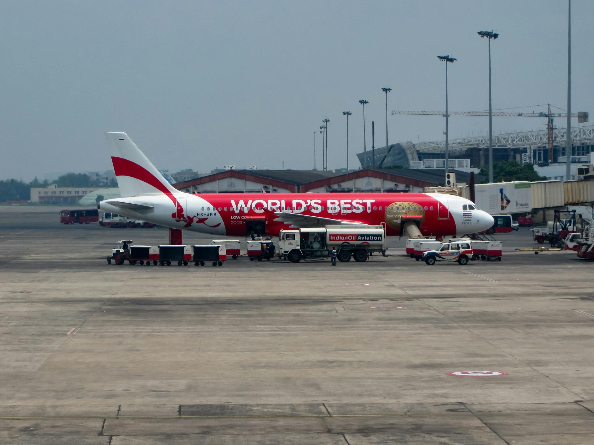 White and Red Passenger Plane on Airport