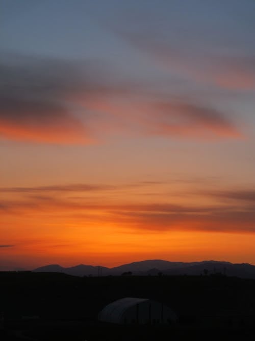 Безкоштовне стокове фото на тему «вертикальні постріл, гора, Захід сонця»