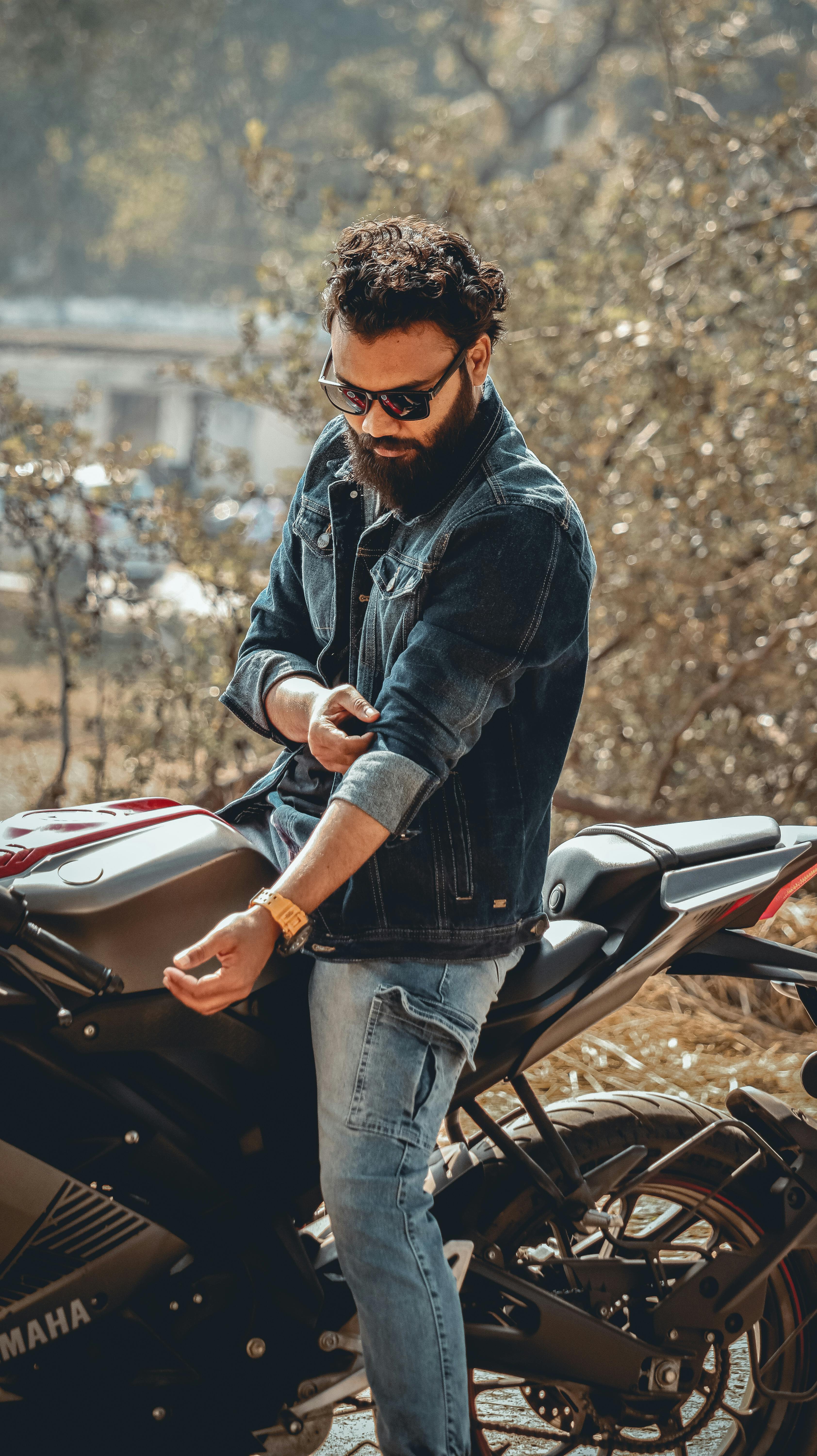 Indian man sitting on motorbike hi-res stock photography and images - Alamy