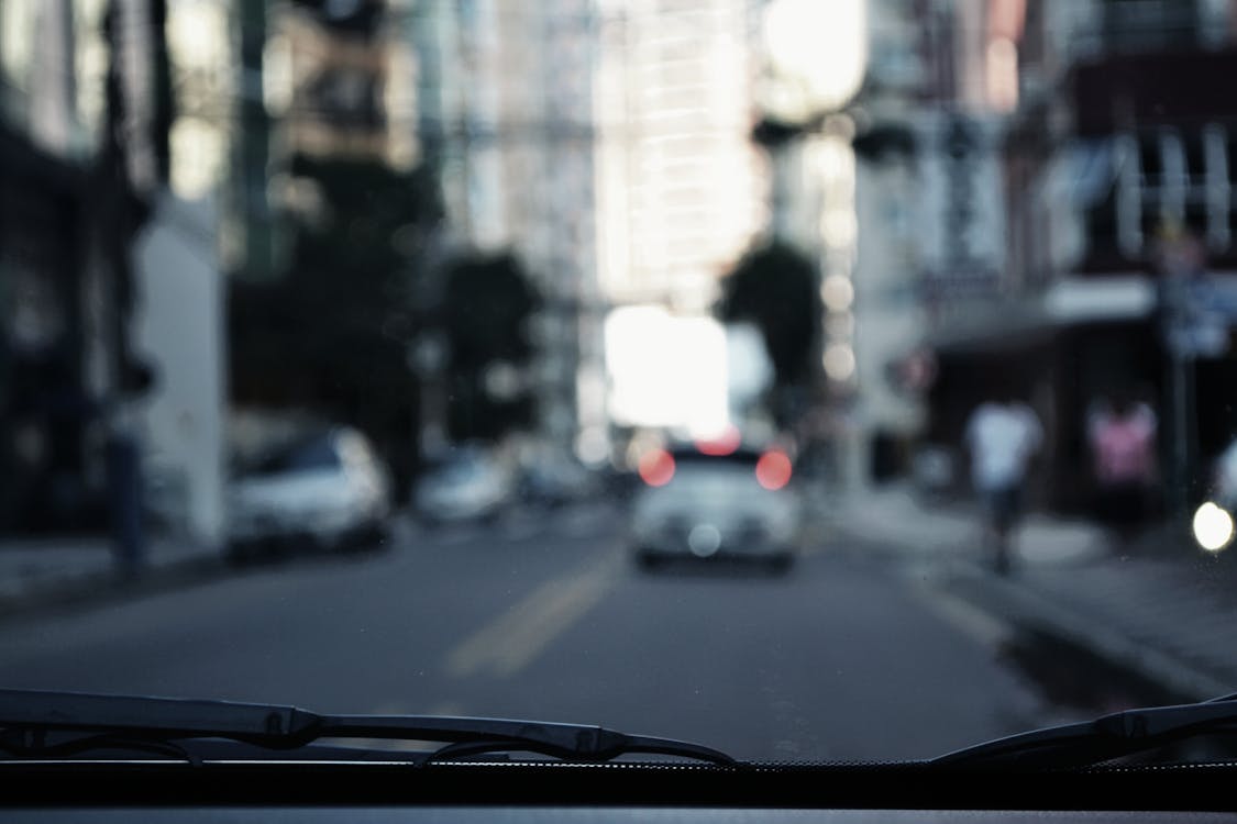 Foto profissional grátis de automóvel, rua