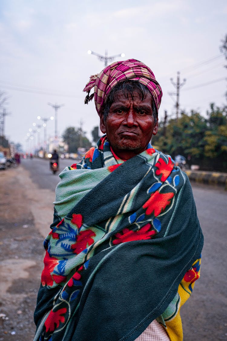 Elderly Man Wrapped In A Blanket 