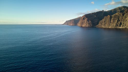 Free A serene view of the coastal cliffs and the vast ocean at Santiago del Teide, Spain. Stock Photo