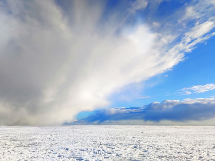 Cirrus Clouds In Blue Sky