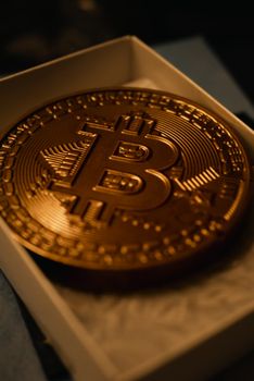 Detailed view of a Bitcoin coin representing modern digital currency and finance.