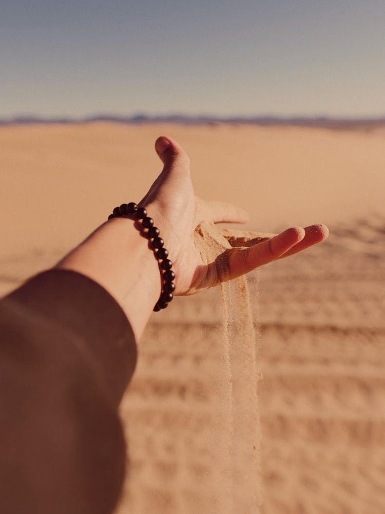 Sand Falling From Hand