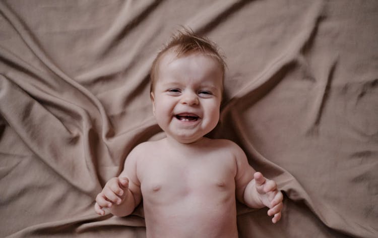 Portrait Of Laughing Baby