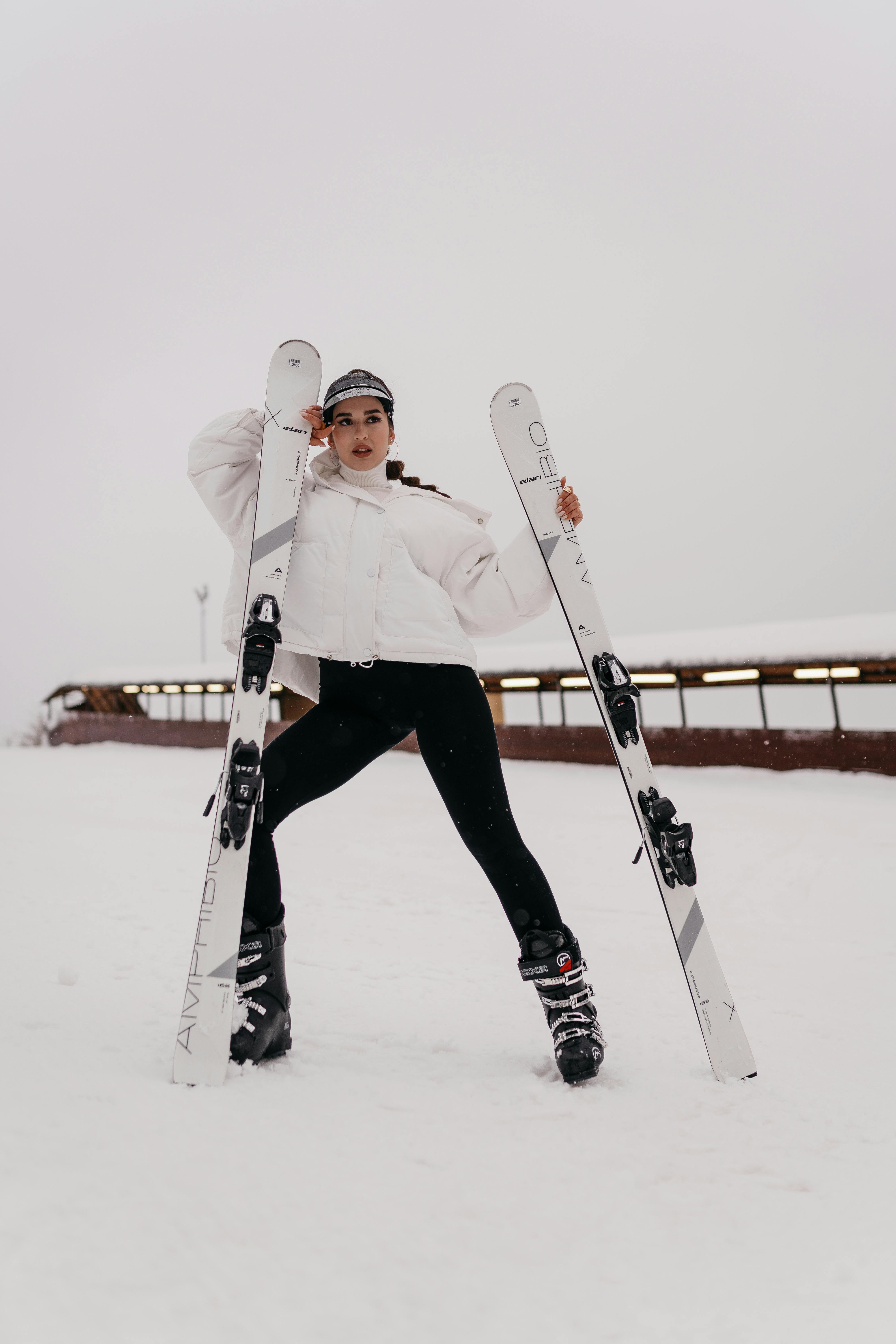 Woman Standing with Ski Poles · Free Stock Photo