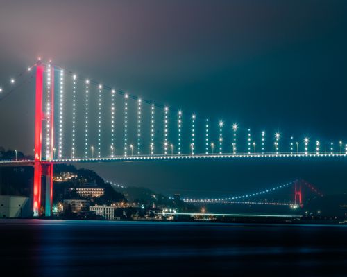 Free Night view of the illuminated Bosphorus Bridge in Istanbul, Turkey, showcasing stunning city lights and architecture. Stock Photo