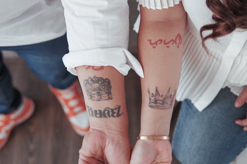 Free stock photo of couple tattoo, king queen, tatto Stock Photo