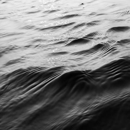 Grayscale Photo of Water Surface