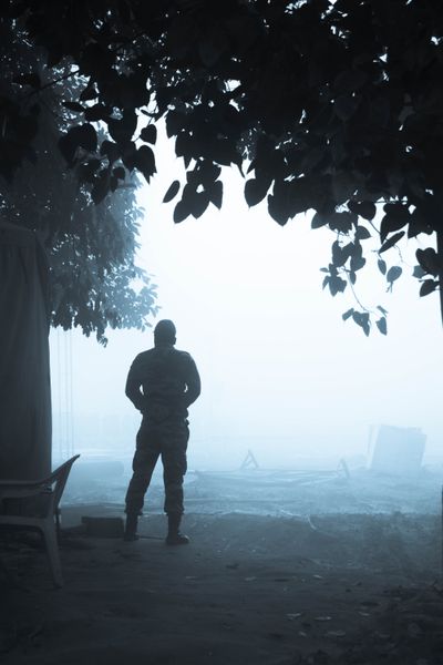 Soldier silhouette in fog, photo by saikat ghosh on Pexels