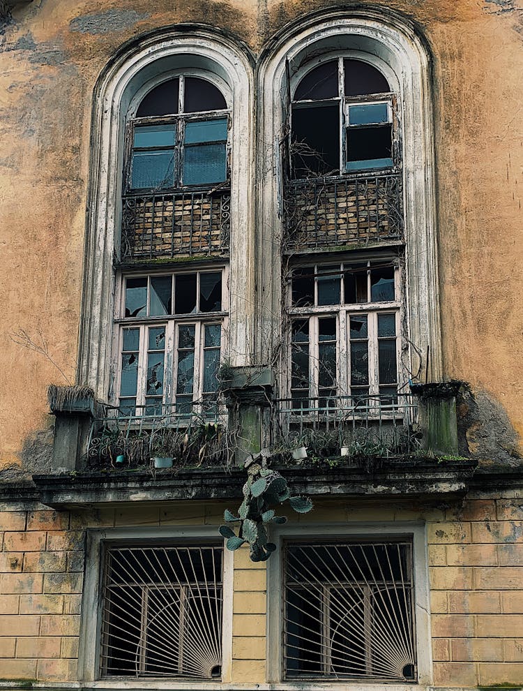 Broken Windows In An Old Building 