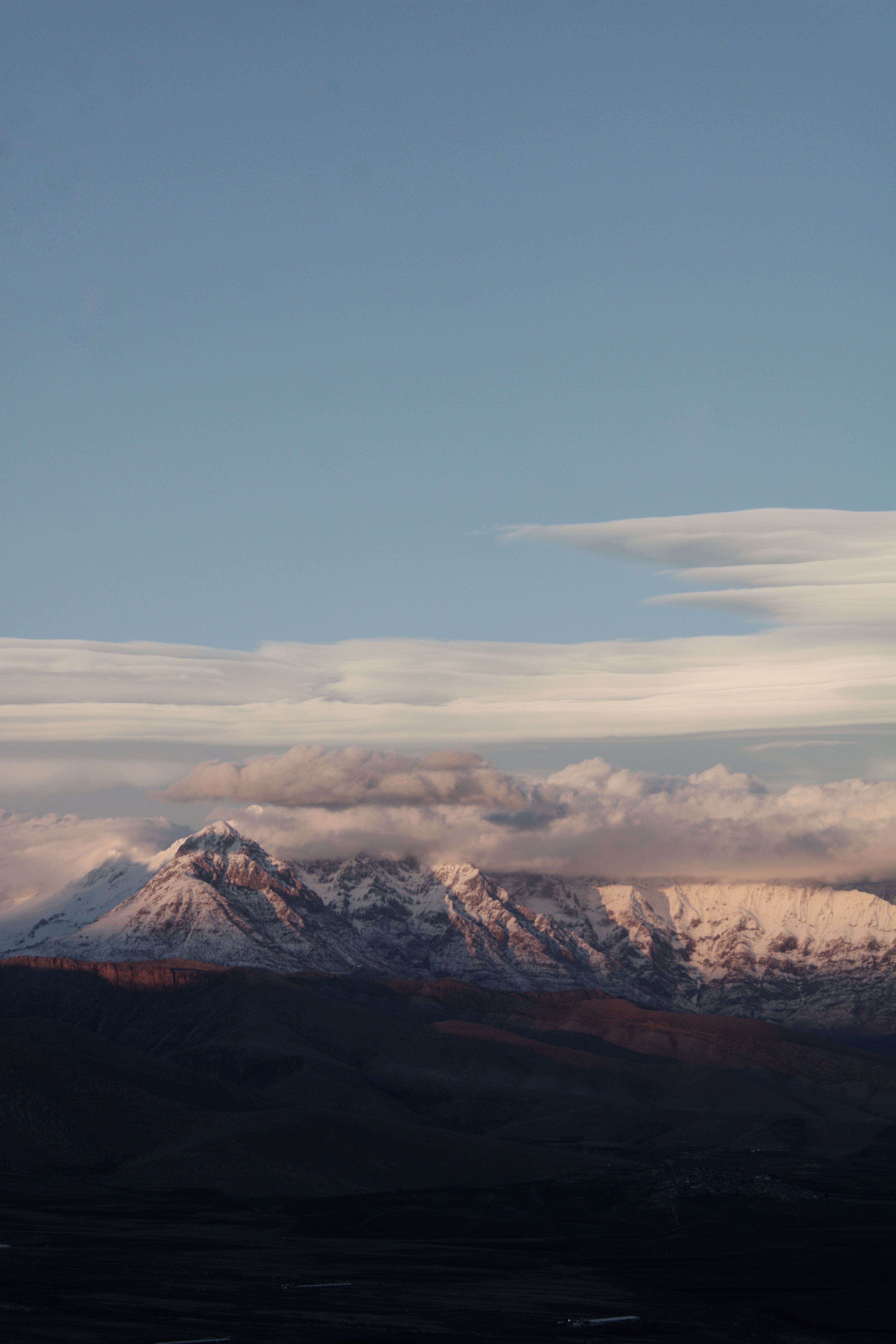 White Clouds Under the Snow Capped Mountains · Free Stock Photo