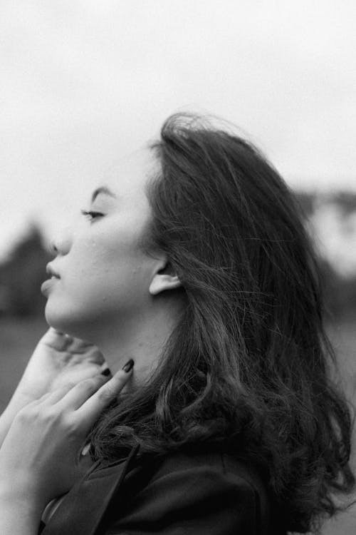 Monochrome Photo of a Woman's Side Profile