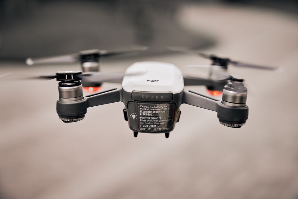 Drone controller with a beach in the background
