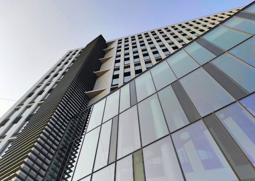 Low Angle Shot of a Glass Building