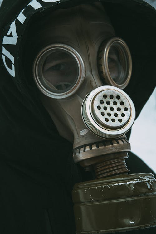 Free A Person Wearing a Gas Mask Stock Photo