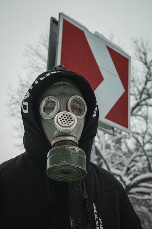 A     Person Wearing Green Gas Mask