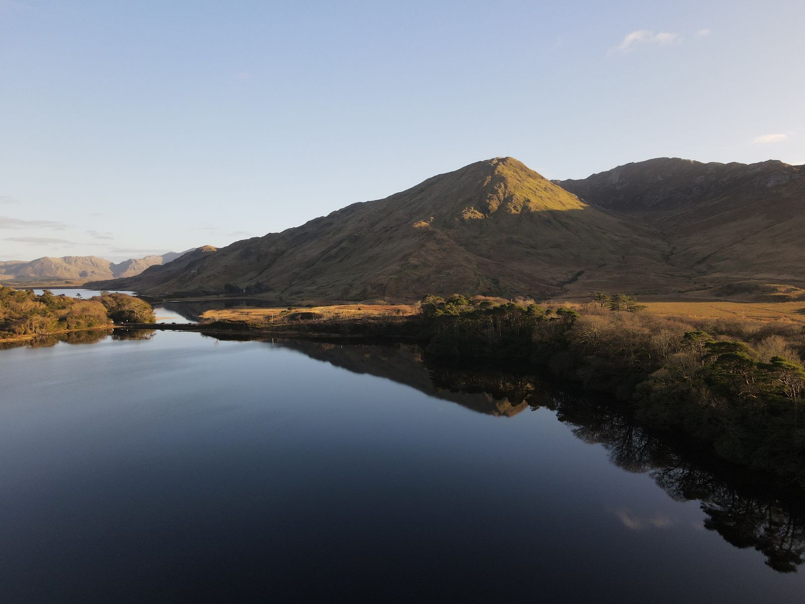 Beauty of Connemara with a view of mountains reflecting on a lake
