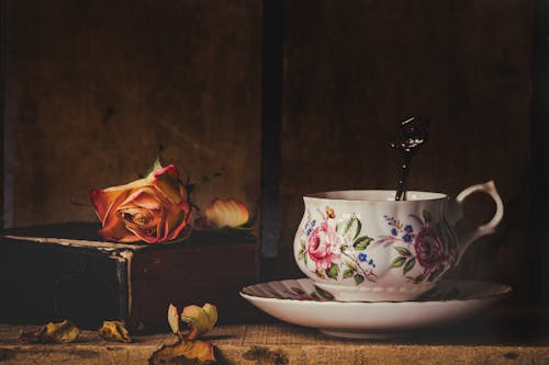 Free White and Pink Floral Ceramic Teacup on Saucer Stock Photo
