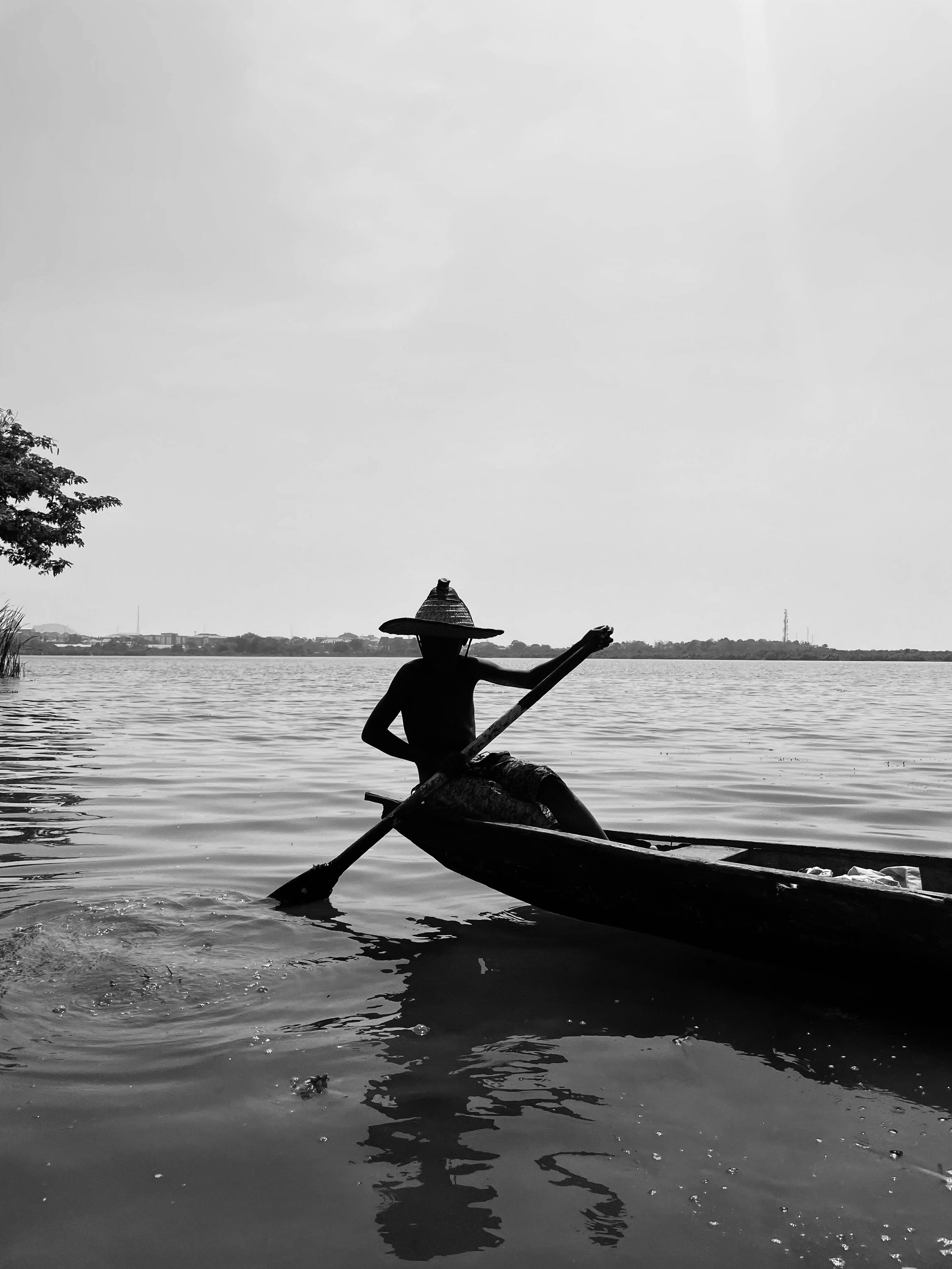 man rowing a boat