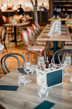 Elegant restaurant interior with neatly arranged tables ready for guests.