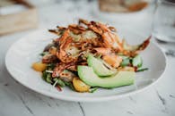 Seafood Based Dish Served on White Plate